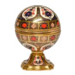 A Royal Crown Derby Millennium Globe Clock, 2000, quartz movement, 17cm h, printed mark and that