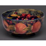 A Moorcroft Pomegranate bowl, c1918-1926, 19cm diam, impressed marks, painted signature Glaze to the