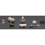 Eight Royal Copenhagen and other miniature models of pigs and a bird, 20th c, various sizes Good