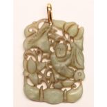 A Chinese carved and pierced jade Shouxing pendant, 20th c, 60mm h excluding gold loop, marked 18k