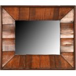 A walnut mirror, in rectangular mahogany frame, 31.5 x 37cm Made up from a Victorian mahogany box