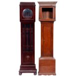 A George III oak longcase clockcase, with ogee moulded flat topped hood, pilasters flanking the