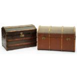 Two cabin trunks, early 20th c, of domed form Much dust and dirt, iron parts somewhat rusty