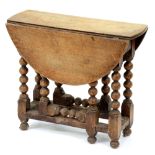 A miniature oak gateleg table, 19th / early 20th c, in Charles II style, the oval top on bobbin