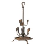 A sheet and wrought iron standing or hanging candelabrum, Northern European, 19th c, of nine