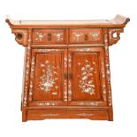 A Chinese hardwood and mother of pearl inlaid cabinet, 20th c, finely decorated with peafowl and