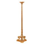 A gilt bronze torchere, 20th c, in Empire style, on three lion monopodia and platform, 125cm h Light