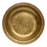 A French silvered brass alms dish, dated 1809, engraved within the reeded rim ECUELLE APPARTENANT