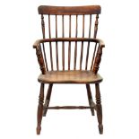 An ash low comb back Windsor armchair, Lincolnshire, second quarter 19th c, with back spindles,