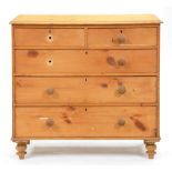 An Edwardian pine chest of drawers, 100cm h; 50 x 104cm Stripped and waxed, several knobs lacking or