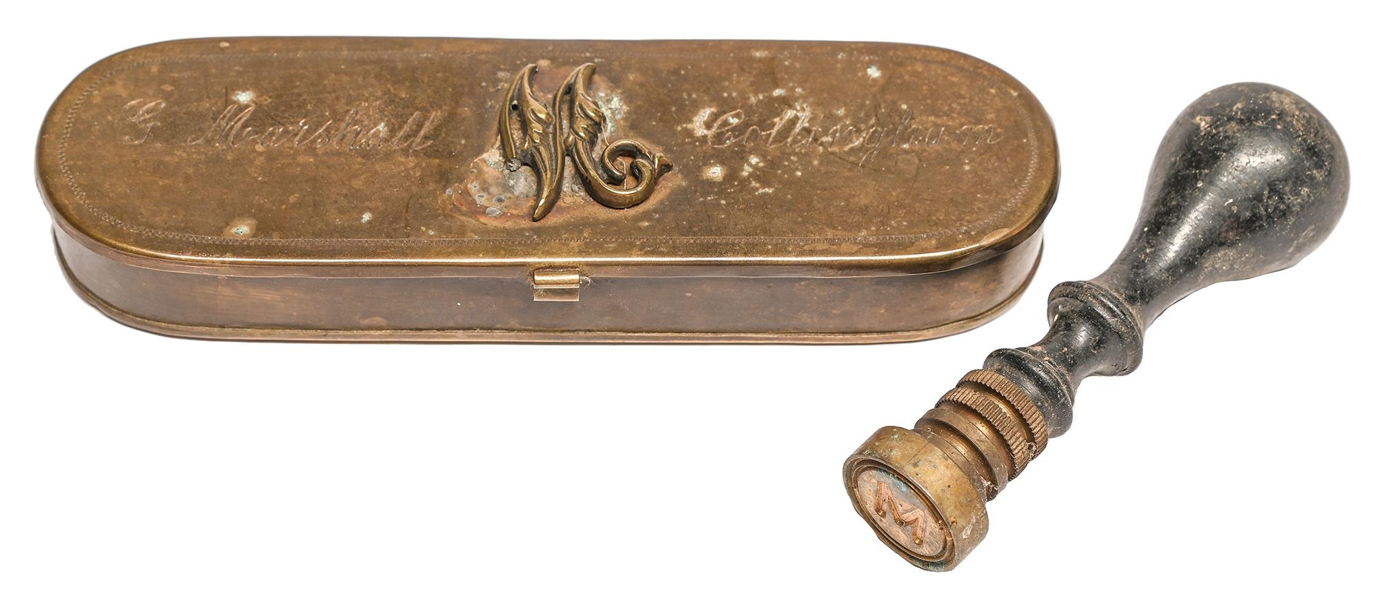 A Victorian sheet brass tobacco box, the lid applied with the initial letter M and engraved G