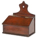 A George III wall hanging mahogany candle box, the shaped back pierced for suspension, sloping