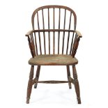 An ash low back Windsor chair, Lincolnshire, mid 19th c, with spindle back, turned arm supports
