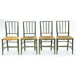 A set of four green painted faux bamboo chairs, early 19th c, rush seated, seat height 44cm Re-