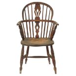 An ash low back Windsor chair, Lincolnshire, mid 19th c, with elm seat, seat height 42cm Much