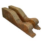 A pair of monumental acanthus and volute carved oak corbels, early 20th c, 21 x 54 x 186cm In