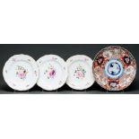 Three Derby moulded plates, c1820, painted with flower sprays and single blooms, the rim gilt,