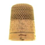 A 9ct gold thimble, by Henry Griffiths & Sons Ltd, Birmingham 1951, 8g Good condition