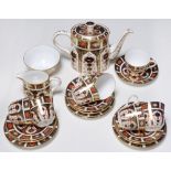 A Royal Crown Derby Imari pattern tea service, 1977, one saucer 1992, teapot and cover 18cm h,