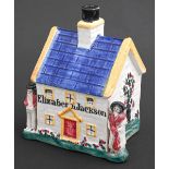 An earthenware cottage bank, Yorkshire, 19th c, decorated in the Pratt palette and inscribed in