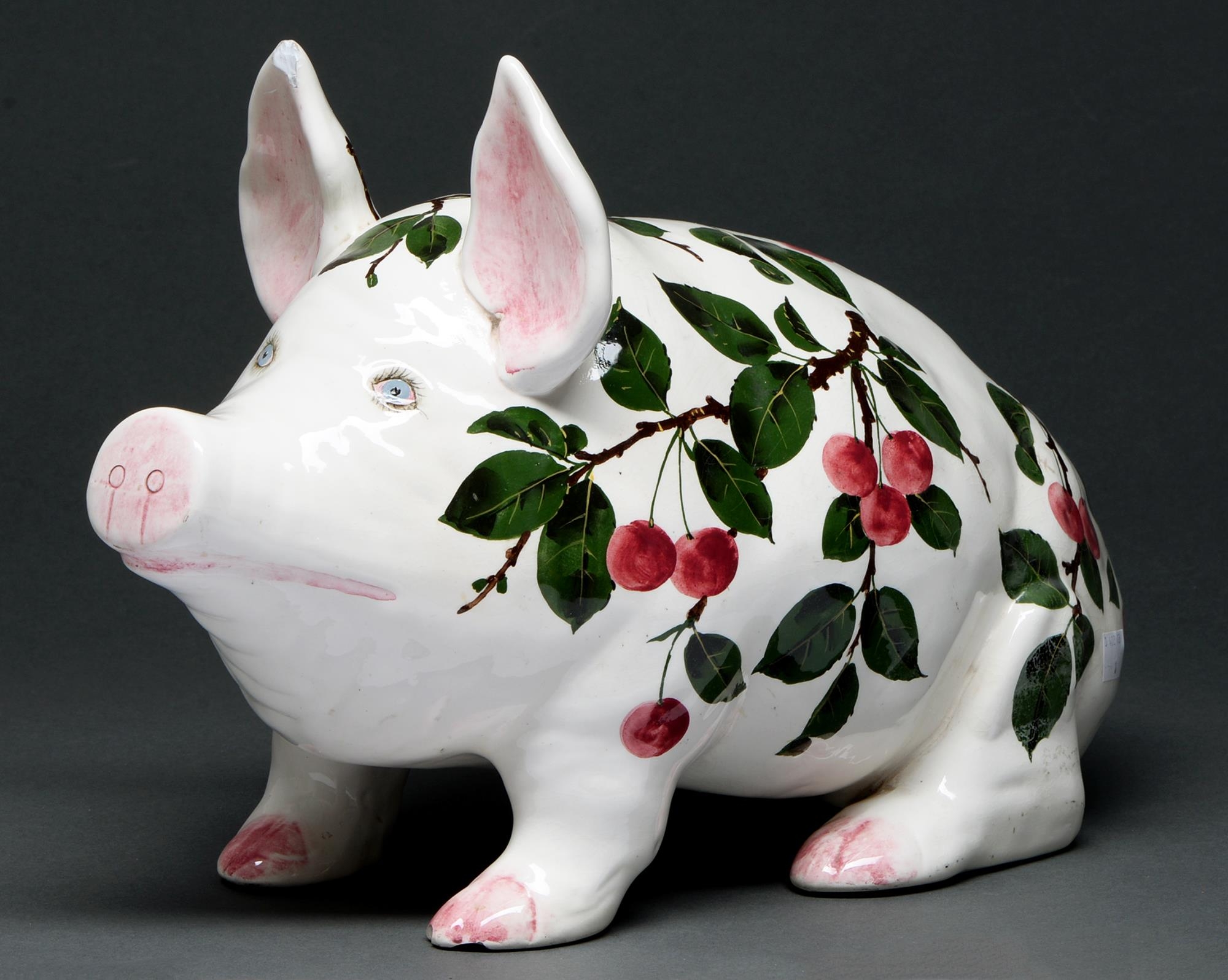 A Wemyss ware pig, Bovey Tracey period, late 1930's, painted by Joseph Nekola with cherries, 27.