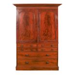 A Victorian mahogany linen press, in the manner of T Willson of Queen Street, London, the upper part