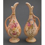 Two Royal Worcester ewers, 1909 and 1910, printed and painted with wild flowers, one heightened in
