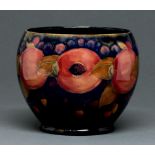 A Moorcroft Pomegranate jardiniere, c1918-c1925, 15.5cm h Star crack in base