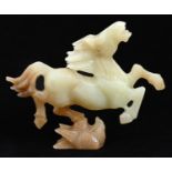 A Chinese jade carving of The Flying Horse of Gansu, 80mm h