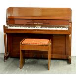 A Squire & Longson walnut upright piano, 132cm l and a walnut music stool Slight scratches on top of