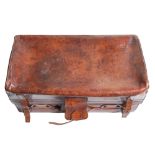 Vintage luggage. A substantial leather suitcase, early 20th c, the brass lock beneath leather flap