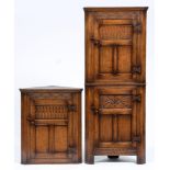 An oak standing corner cupboard, with carved panels and iron butterfly hinges, 178cm h; 38 x 70cm