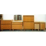 A Lebus mid-century modern teak bedroom suite, c1960 (5) Bedside cupboards water stained. Smaller