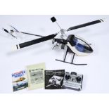 A radio controlled model helicopter, from a Micro-mold 'Lark II' kit with Apex FM digital radio