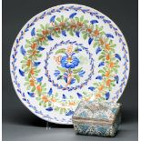 A Northern European tin glazed earthenware dish, early 20th c, painted in cobalt, green, ochre and