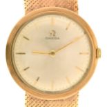An Omega 9ct gold gentleman's wristwatch, 31mm diam, on 9ct gold mesh bracelet with Omega device
