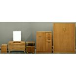 A G-Plan light oak bedroom suite, E Gomme Ltd for Maple, mid 20th c, wardrobe 175cm h; 53 x 122cm (