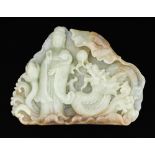 A Chinese jade boulder carving of Guanyin and a dragon, with peach and lotus, 12cm h Good condition