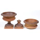 A pair of Victorian saltglazed brown stoneware garden vases, with egg-and-dart rim, on fluted foot