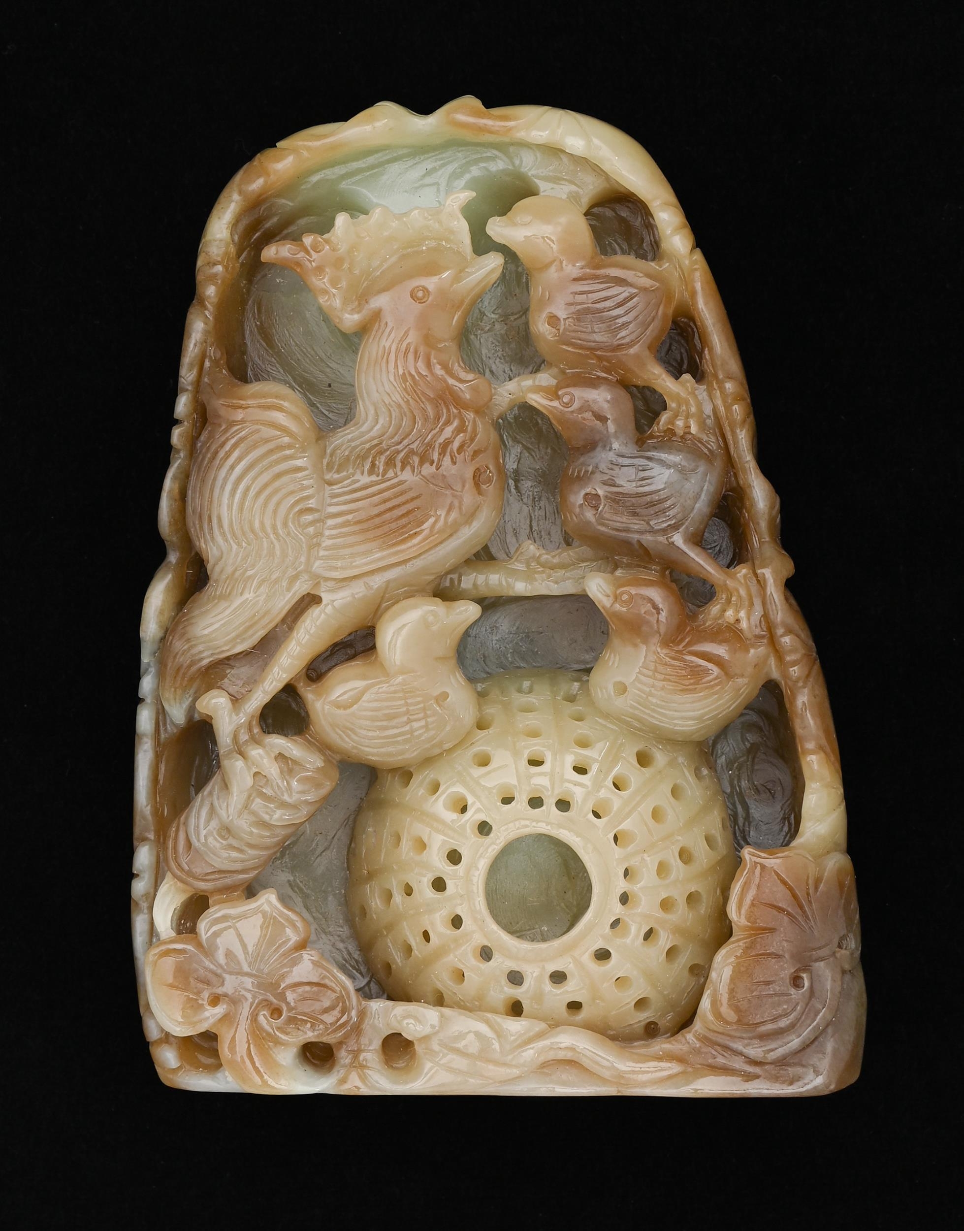 A Chinese jade boulder carving of a bird and young, 12cm h Good condition