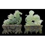 A Chinese jade carving of a monkey and peach, 13.5cm h, carved stone stand and a Chinese jade