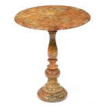 A turned onyx pedestal table, 52cm h; 45cm diam Good condition