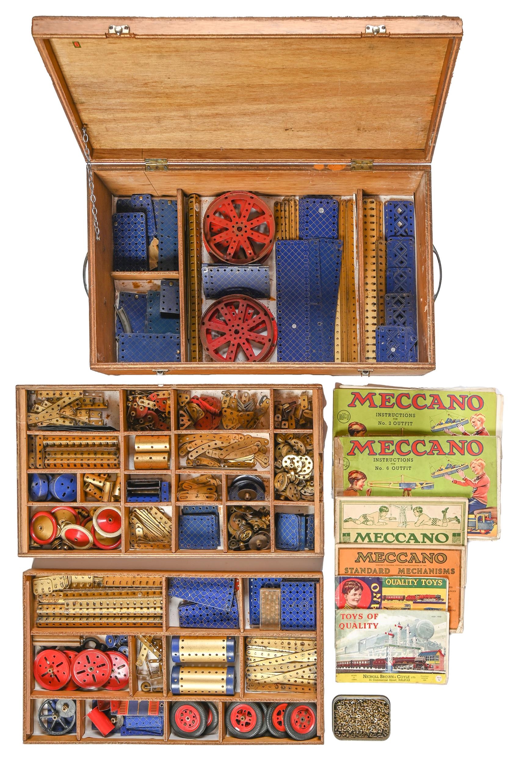 A collection of Meccano, c1930’s, blue and gold, and several contemporary printed instruction books