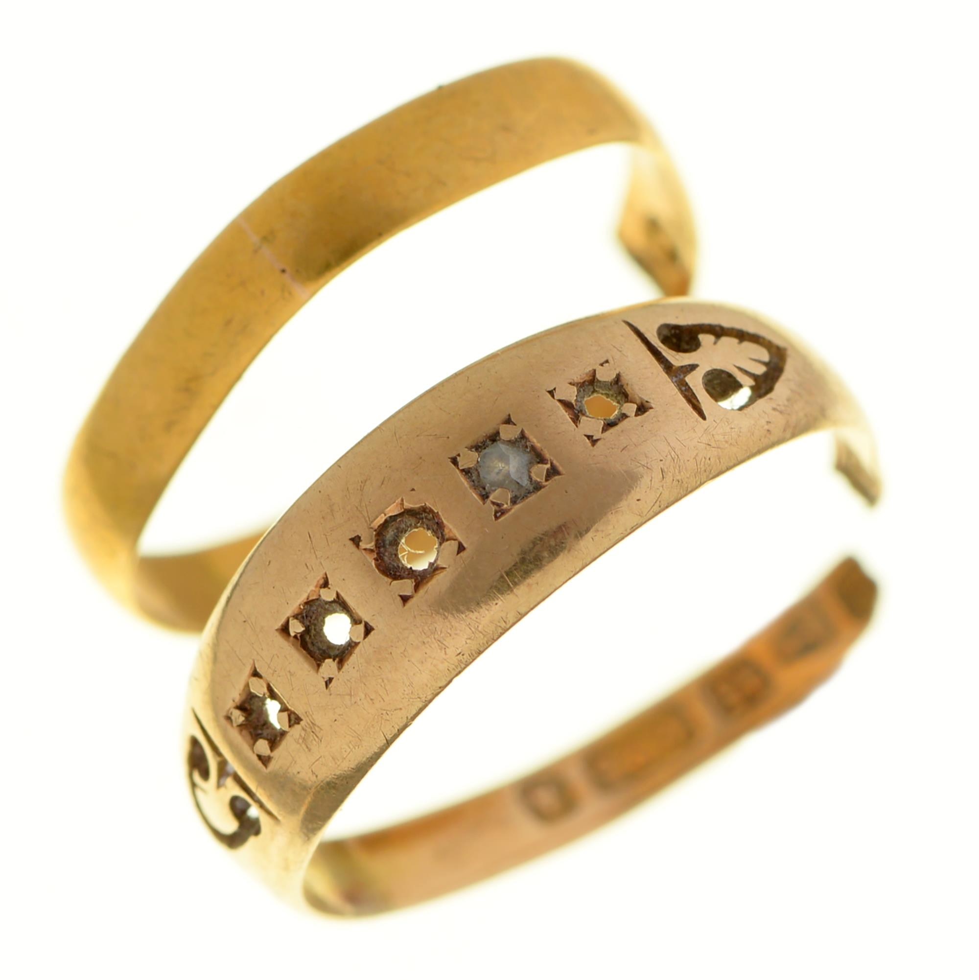 A 22ct gold wedding ring, 1.1g and a 15ct gold ring formerly gem set, 2g (2) Both damaged