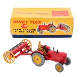 Dinky toys. Farm tractor & hay rake No 310, boxed
