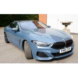 Motor Car. Exceptionally low mileage 2019 (May) BMW 840D X Drive, two door, blue with cream
