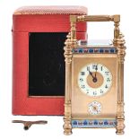 A French gilt brass and champleve enamel carriage clock, early 20th c, with primrose enamel