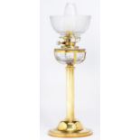 A Victorian brass oil lamp,  of plain columnar form, on domed foot with cradled cut glass fount