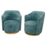 A set of four plain and quilted kingfisher blue velour chairs, on brass ring foot