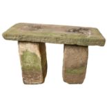 A sandstone garden seat, rectangular slab on two uprights, 64cm h; seat 48 x 104cm